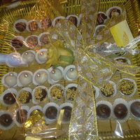 Holiday Cake Ball Platter my holiday item over here in the middle east. Red velvet in white chocolate, german chocolate topped with shredded coconut, peanut butter...