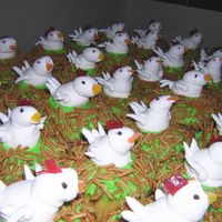 Flock Of Hens Cupcakes for daughter's Kindergarten class. Got the idea of hens from Good Housekeeping. Used a boiled frosting for the hens, when it...