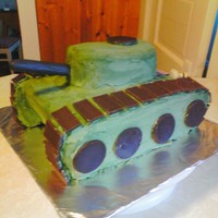 Tank Cake This is a tank that was made for 2 twin boys turning 11. WASC carved with buttercream and fondant accents.