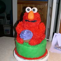 Elmo Birthday A cake I made for a coworkers son's birthday. Made with the wilton 3D bear pan. I thought that in the end it turned out looking like...