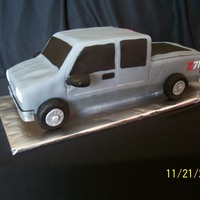 Silverado Extended Cab Pickup Cake I did this for a 16 year old boy who got a gray extended cab Silverado pickup for his birthday. The cake was pound cake so I could carve it...