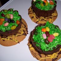 Egg Baskets chocolate mini-cakes with coconut grass and jelly bean eggs.