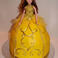 Princess Belle This was my first time working with fondant other than accent pieces. It was a bit frustrating but I'm happy with the outcome. Got my...