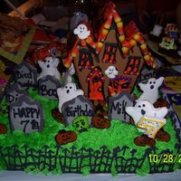 Little Graveyard Cake... My daughters 7th birthday party is four days before Halloween and she wanted a Halloween themed party this year. The Haunted house is the...