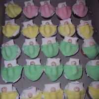 Baby Shower Cupcakes... These were something that I had been wanting to do for a while since seeing them in one of the Wilton yearbooks. They were fun to do. I...