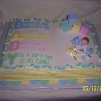 Baby Shower Cake... French Vanilla 2 mix book pan cake with buttercream and fondant accents. This was a very special cake for a very special mother to be. She...