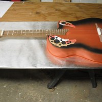 Guitar Grooms Cake On the way out with this cake my husband made me stop, in the garage no less, so he could get a photo. Lovely bakcground. UGH. but the...