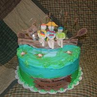 Fishing Cake for a grandfather and two grandsons. Gumpaste/fondant accents.