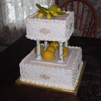Lemons Bridal attendants wanted a "Lemon" themed cake...real lemons on the divider...gumpaste for the topper.