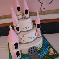 Princess Castle Loved doing this cake! Thanks to Excitednewbie for letting me use her design. First time making a little gumpaste person. She didnt turn...