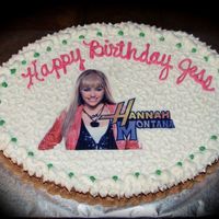 Hannah Montana Birthday Oval sheetcake with vanilla and chocolate buttercream. chocolate fudge cake. Edible image of H. Montana. Clear cake glitter sprinkled on...
