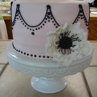 Pretty In Pink Did this cake just because. Never try stringwork for the first time with black icing on a pale pink fondant! :) TFL