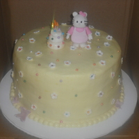Hello Kitty hello kitty with her own bday cake, i am loving this stuff called disco dust i just got.