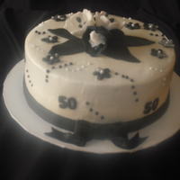 Pretty Over The Hill iced in bc. tulips are gumpaste, other accents are fondant.