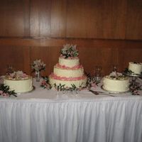 Wedding Cakes Table This is a arrangement of cakes for a wedding. It includes a 3 tiered cake (16 inch, 12 inch, 8 inch round), two 10 inch rounds, and a 6...