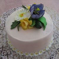 Monther's Day Buttercream with fondant flowers.