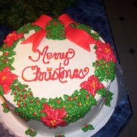 Christmas Wreath This cake was so much fun for me! It was my first time making a fondant bow. I think it turned out OK.