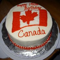 Canada Day Cake Vanilla cake with vanilla BC and strawberries in the middle.