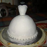 Emilys Bride Cake Vanilla cake with vanilla BC icing, fondant covered 'doll'. The Bride-to-be loved her cake as well as everyone at the shower.