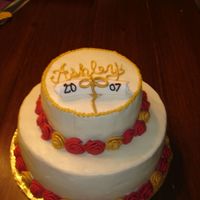Red, Gold And White Graduation Cake buttercream frosting with fondant rosetts painted with luster dust