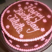 Brown And Pink Birthday Cake chocolate buttercream frosting with fondant accents