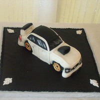 Grooms Car Cake This grooms car cake was really rice krispy treats covered with fondant. it was 9-10 inches long and way too small to carve out of cake.