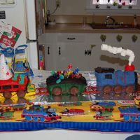 Finished Pic this is the finished product. i made it for my nephews 3rd birthday. he loves trains and even told me how he wanted it decorated.