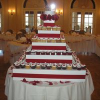 My First Wedding Cupcake Tower Yellow, red velvet and triple chocolate cupcakes with buttercream icing and gumpaste roses.