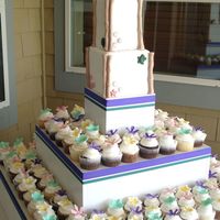 Emily cupcakes topped with fondant flowers