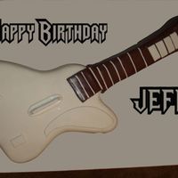 Guitar Hero Cake This was a strawberry shortcake cake in the shape of the guitar hero guitar.
