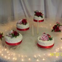 Debra Sotas with fake plastic beads, satin ribbon. Silk flowers provided by the bride.