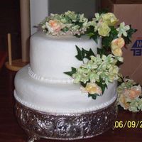 Chris's Wedding Bride requested peach and sage silk flowers for her 2nd small wedding.