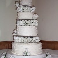 Andrea The bride wanted all white roses with white swiss dots. She ordered the flowers off e-bay and they came in the day before I needed them....