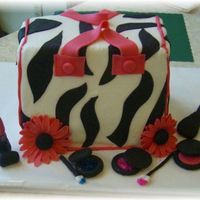 Purse Cake This was my second purse cake. It was inspired by a few CC member's cakes. I had so much fun doing this cake.