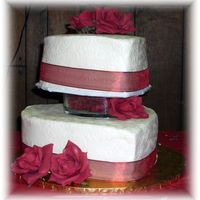 Red And White Hearts This was for a Feb. wedding. I used an impression mat on the sides. I also used a glass heart dish filled with rose petals between the...