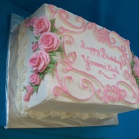 Yvonne And Nicole All buttercream with royal icing roses.