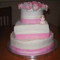 Communion Cake Covered in melting buttercream!!! Ribbon is fondant with RI writing. Roses are gumpaste. "Bubblegum buddy" is made to look like...