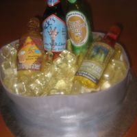 30Th Birthday Sugar Beer Bottles This was a 30th birthday party cake for my soon to be husband.. Cake is covered in silver fondant to look like a steel bucket. Ice and...