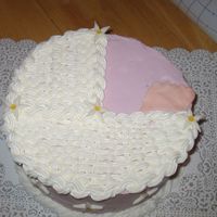 Wilton Baby Shower Variation Chocolate cake, all buttercream with MMF flowers and foot.