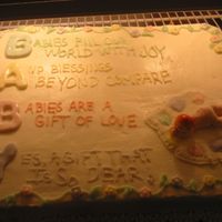 Baby Shower yellow cake with buttercream. Fondant baby and letters