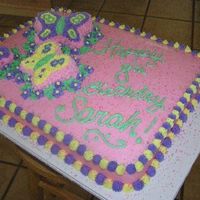 Butterfly Cake this cake was done in b.c. icing. the butterflies are cupcakes and raised off of the sheet cake. The #8 is in the wings of one of them for...