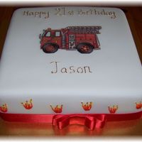 21St Cake Choc mud cake, picture is laminated and flames were piped on and coloured. It was for a firefighter.