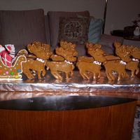 Santa And His Reindeer Santa and his reindeer made entirely of gingerbread dough. Takes some time as they were hand cut but my grandchildren loved it.