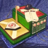 Red Sox Grooms Cake This is a 1/2 sheet cake with a double layer 1/4 sheet on top. the jersey, ball and bat are made out of fondant. The cap is a candle I...