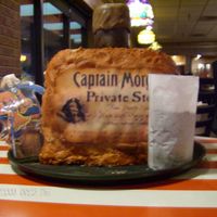 Oh, Captain, My Captain! This is my first sculpted cake, which I made for my nephew's twenty-first birthday. I had to replicate the shape of a Captain Morgan...