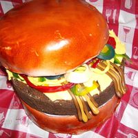 Blackout Burger Cake This cake was decorated during a power blackout. Since it was too dark to color icings to make decorations, I used various fruit snacks and...