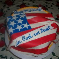 4Th Of July Cake chocolate cake with buttercream icing fondant flag first time ever using fondant. I liked it!