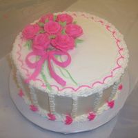 100_1213.jpg last cake of Wilton Course 1 10" yellow cake with strawberry filling, buttercream icing. my first roses I took course 1 and 2 in the...