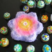Tie Dye Flower & Cupcakes I made this for my neighbors 16th birthday party. She wanted a flower abut she also wanted a tie-dye theme. This is how I managed to put...