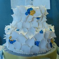 Shabby Chic The bride called me the week before her wedding and asked for a cake with royal blue and yellow. She let me come up with the design. I just...